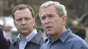 FEMA's Michael Brown (left) and President George W. Bush, seen in 2003, were widely criticized for their response after Hurricane Katrina devastated the Gulf Coast in 2005.