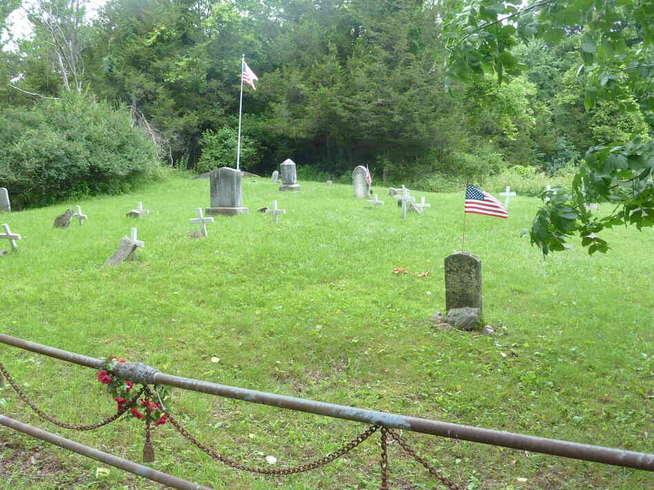 This communal plot in Grindstone Cemetery is well-maintained. But it holds only a portion of the island's graves.