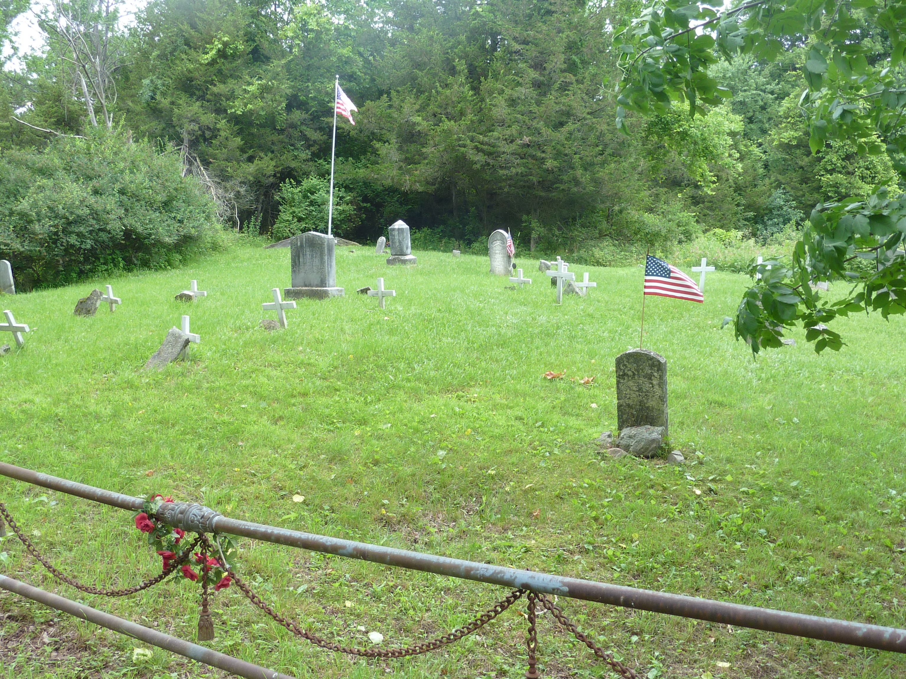 This communal plot in Grindstone Cemetery is well-maintained. But it holds only a portion of the island's graves.