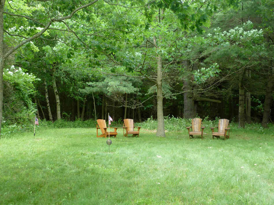 Imogene Augsbury buried her son and two of her husbands in this clearing, on one of the island's highest points. Her parents are also buried there.