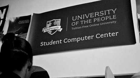 Students work at the University of the People student computer center in Haiti. Students from 129 countries are currently enrolled with the institution. Students work at the University of the People student computer center in Haiti. Students from 129 countries are currently enrolled with the institution.