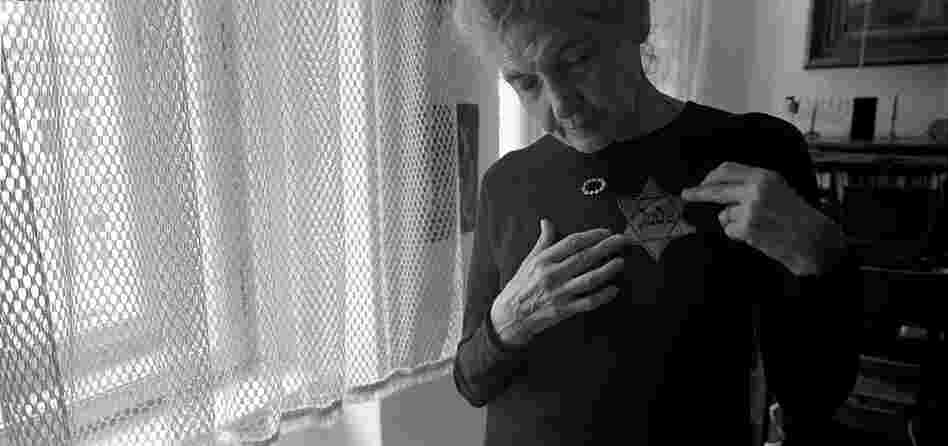 Andula Lorencova, born in 1927, in her apartment with her original yellow star, Prague, June 2012. While her father was "trying to procure official Chinese approval for his family to join him, Andula along with her brother and mother were deported to Terezin."