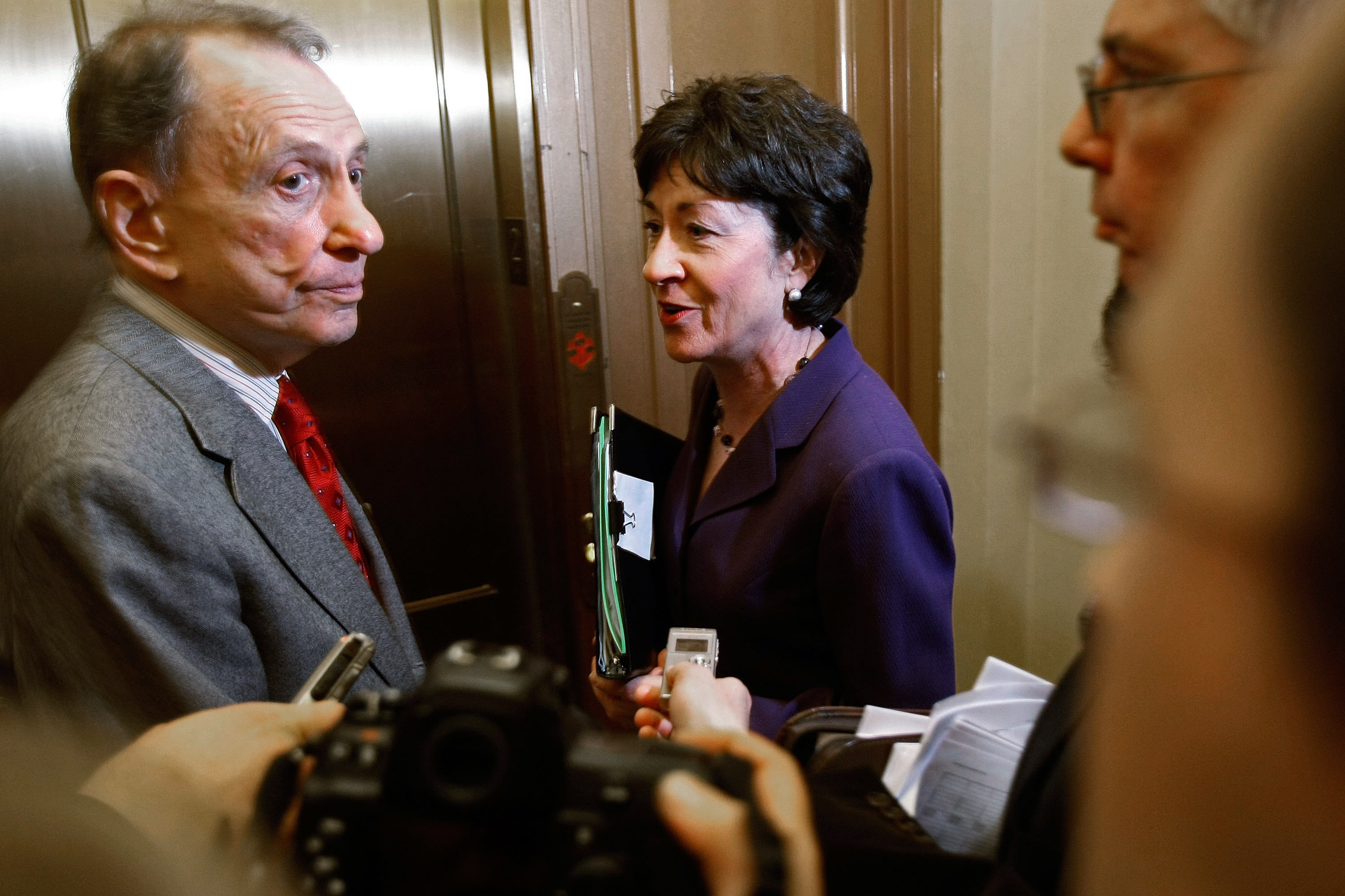 Specter and Sen. Susan Collins, R-Maine, board an elevator after a February 2009 meeting with Senate Majority Leader Harry Reid, D-Nev., to find a bipartisan compromise on the stimulus package. Specter and Collins were two of three Republicans who voted for the plan. Collins, like Specter, was considered to be one of a dwindling number of moderate Republicans. Specter and Sen. Susan Collins, R-Maine, board an elevator after a February 2009 meeting with Senate Majority Leader Harry Reid, D-Nev., to find a bipartisan compromise on the stimulus package. Specter and Collins were two of three Republicans who voted for the plan. Collins, like Specter, was considered to be one of a dwindling number of moderate Republicans.