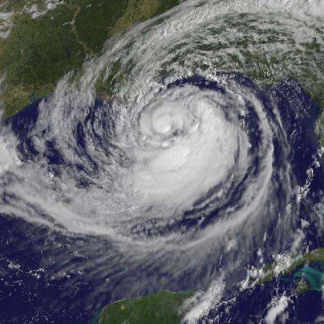 This visible image of Tropical Storm Isaac taken from NOAA's GOES-13 satellite shows the huge extent of the storm, where the eastern-most clouds lie over the Carolinas and the western-most clouds are brushing east Texas.