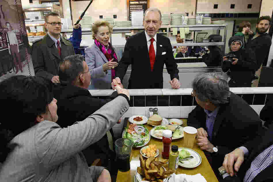Specter shakes hands with Philadelphia voters on primary day in 2010. He lost the Democratic primary to Joe Sestak, ending the veteran senator's political career. Conservative Republican Pat Toomey defeated Sestak in the general election.