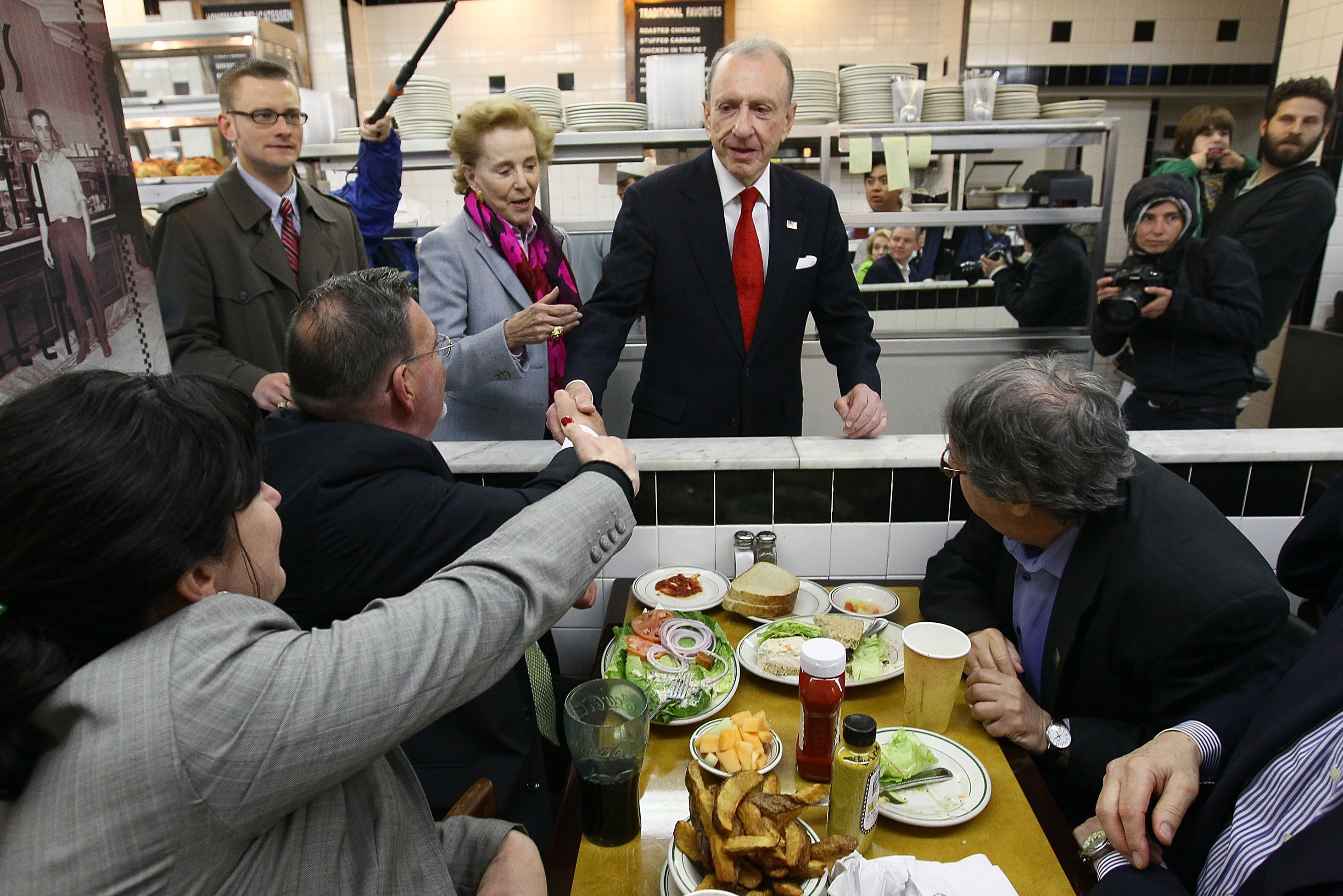 Specter shakes hands with Philadelphia voters on primary day in 2010. He lost the Democratic primary to Joe Sestak, ending the veteran senator's political career. Conservative Republican Pat Toomey defeated Sestak in the general election. Specter shakes hands with Philadelphia voters on primary day in 2010. He lost the Democratic primary to Joe Sestak, ending the veteran senator's political career. Conservative Republican Pat Toomey defeated Sestak in the general election.
