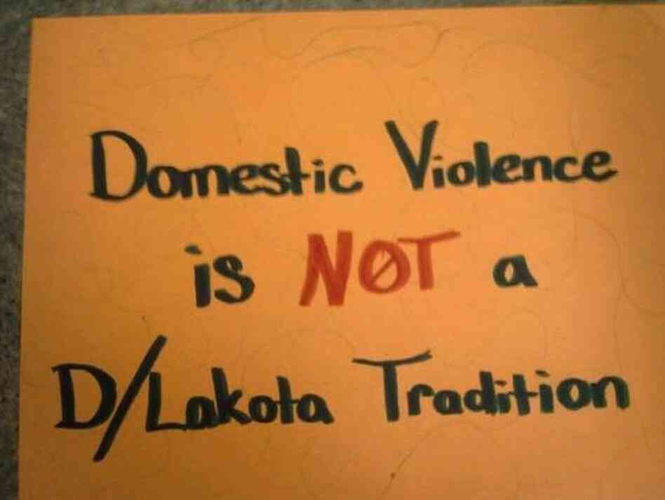 A handmade poster at Wiconi Wawokiya.