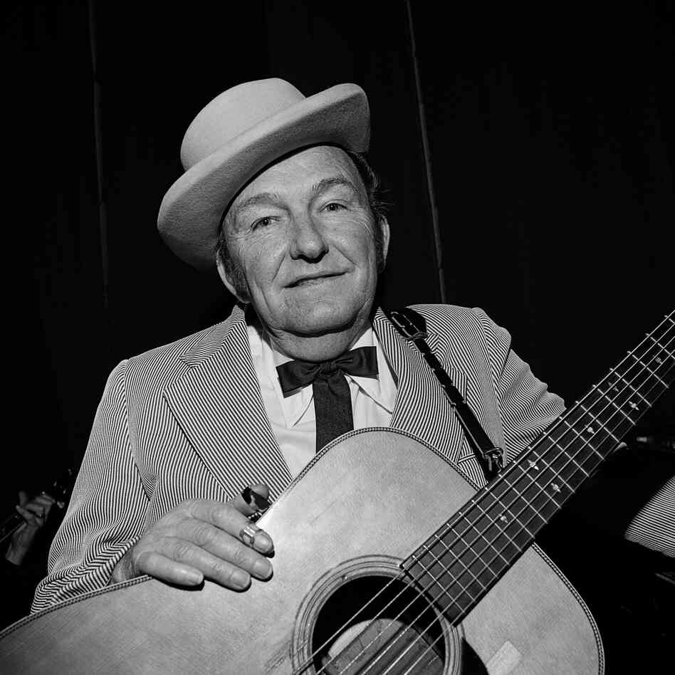 Lester Flatt, Ryman Auditorium, Nashville, Tenn., 1972. "Lester Flatt and banjoist Earl Scruggs were the successful Flatt and Scruggs. Flatt's contributions included strong baritone vocals and a signature guitar run, widely imitated even today."