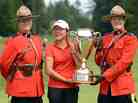 Lydia Ko accepts her winner's trophy at the CN Canadian Women's Open in Vancouver, surrounded by members of the RCMP. Lydia Ko accepts her winner's trophy at the CN Canadian Women's Open in Vancouver, surrounded by members of the RCMP.