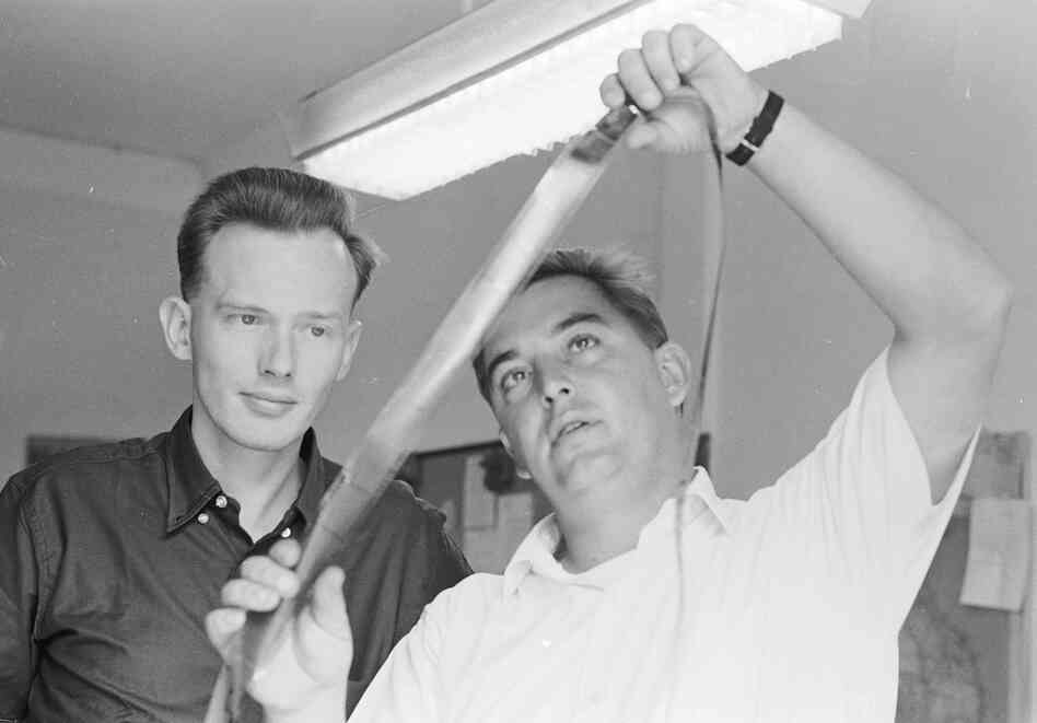 Browne (left) is seen with AP photographer Horst Faas in the Saigon office, April 3, 1964.