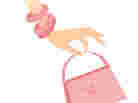 A pink hand and purse.
