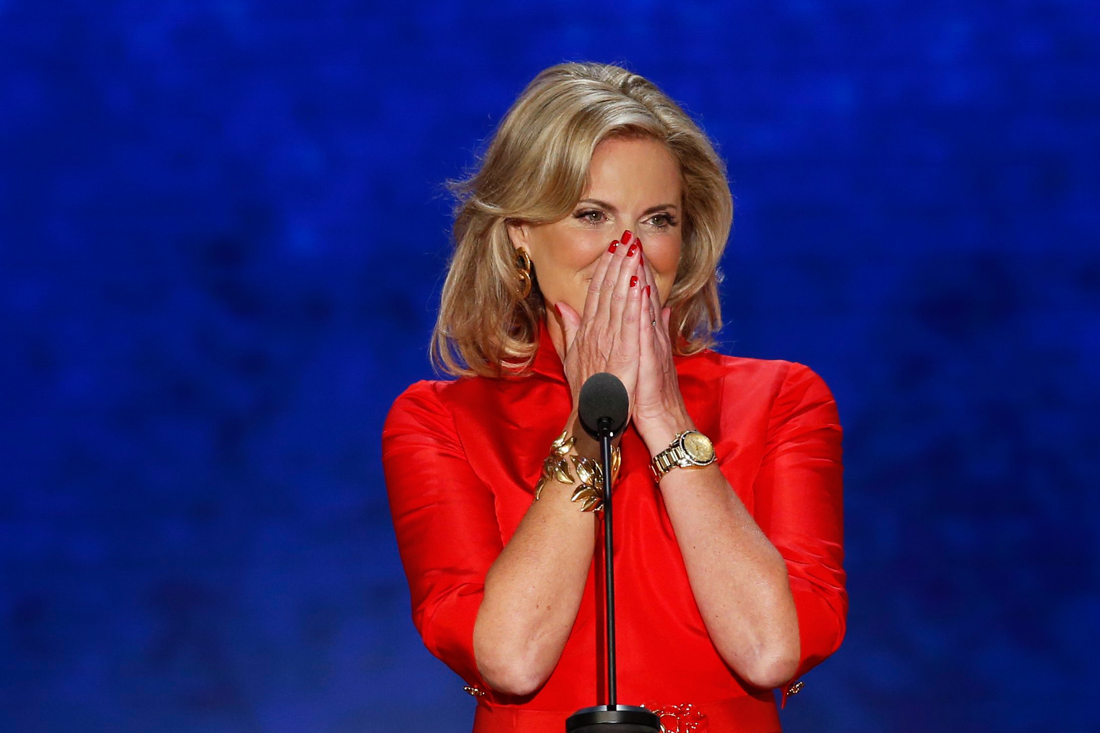 Ann Romney, wife of Mitt, reacts as she takes the stage to address delegates during tthe Republican National Convention in Tampa, Fla.