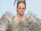 A model walks down the runway during the Maria Sofia Bahlner S/S 2013 Fashion Show from the Swedish School of Textiles during the Mercedes-Benz Stockholm Fashion Week.