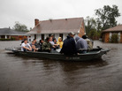 Rescue workers transport residents trapped by rising water from Hurricane Isaac in the River Forest subdivision on Wednesday in LaPlace, Louisiana. The large Level 1 hurricane slowly moved across southeast Louisiana, dumping huge amounts of rain and knocking out power across the Gulf Coast. Rescue workers transport residents trapped by rising water from Hurricane Isaac in the River Forest subdivision on Wednesday in LaPlace, Louisiana. The large Level 1 hurricane slowly moved across southeast Louisiana, dumping huge amounts of rain and knocking out power across the Gulf Coast.