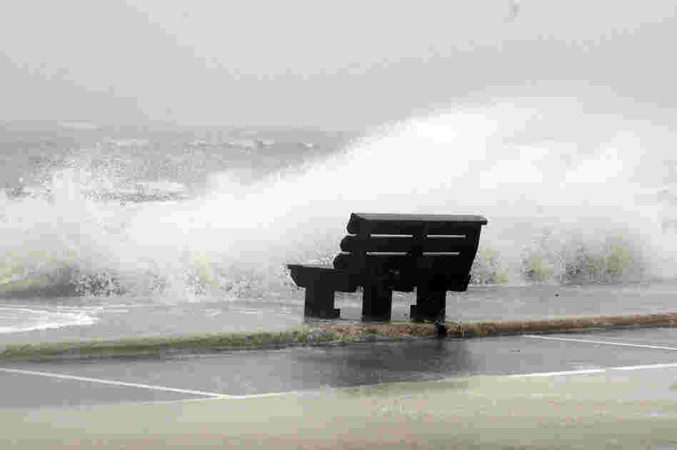Waves from Hurricane Isaac batter a pier in Gulfport, Miss.