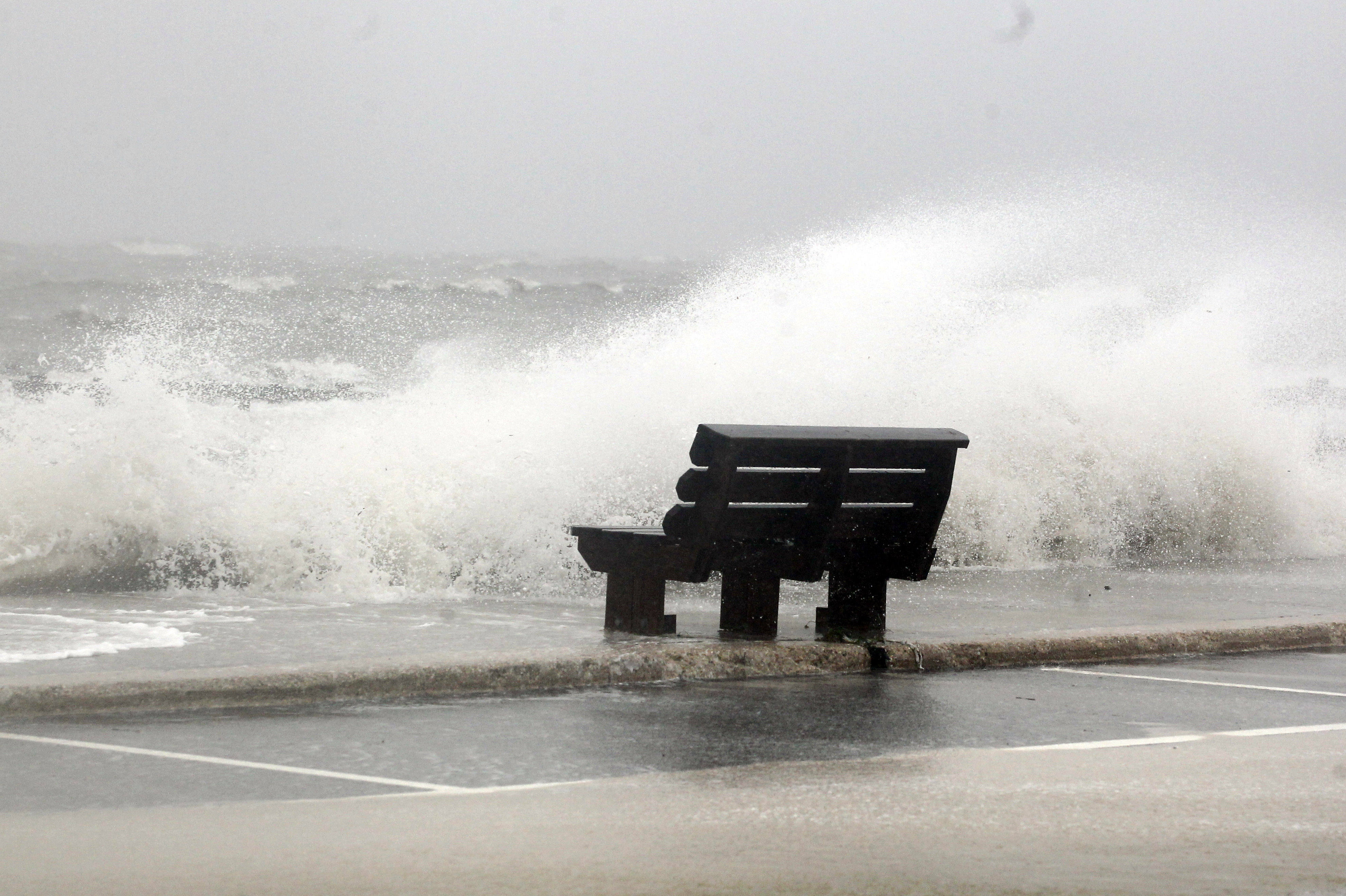 Waves from Hurricane Isaac batter a pier in Gulfport, Miss.