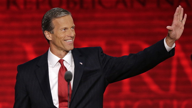South Dakota Sen. John Thune waves to delegates during the Republican National Convention in Tampa, Fla., on Wednesday.