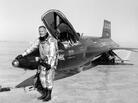 Neil Armstrong stands next to his X-15 rocket plane at Edwards Air Force Base in California. Neil Armstrong stands next to his X-15 rocket plane at Edwards Air Force Base in California.