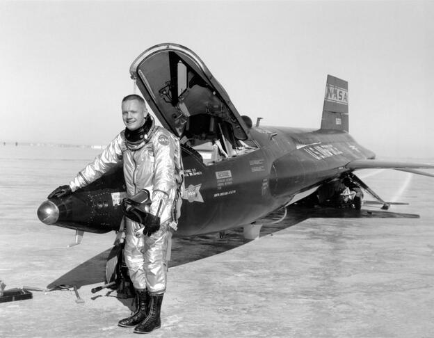 Neil Armstrong stands next to his X-15 rocket plane at Edwards Air Force Base in California.