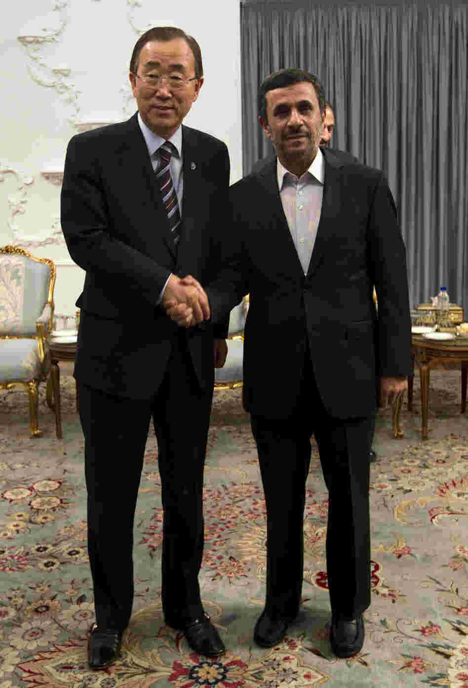 U.N. Secretary-General Ban Ki-moon (left) and Iranian President Mahmoud Ahmadinejad hold talks at the Iranian president's office in Tehran on Wednesday.