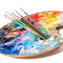 Artist's palette with brushes over white background Artist's palette with brushes over white background