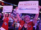 Georgia delegates Ruby Robinson (right) and Kathy Noble hold signs and cheer during the Republican National Convention in Tampa, Fla., where a parade of female officials and officeholders appeared on stage Tuesday. Georgia delegates Ruby Robinson (right) and Kathy Noble hold signs and cheer during the Republican National Convention in Tampa, Fla., where a parade of female officials and officeholders appeared on stage Tuesday.