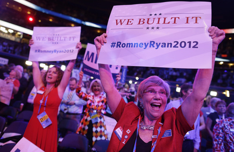 Georgia delegates Ruby Robinson (right) and Kathy Noble hold signs and cheer during the Republican National Convention in Tampa, Fla., where a parade of female officials and officeholders appeared on stage Tuesday. Georgia delegates Ruby Robinson (right) and Kathy Noble hold signs and cheer during the Republican National Convention in Tampa, Fla., where a parade of female officials and officeholders appeared on stage Tuesday.