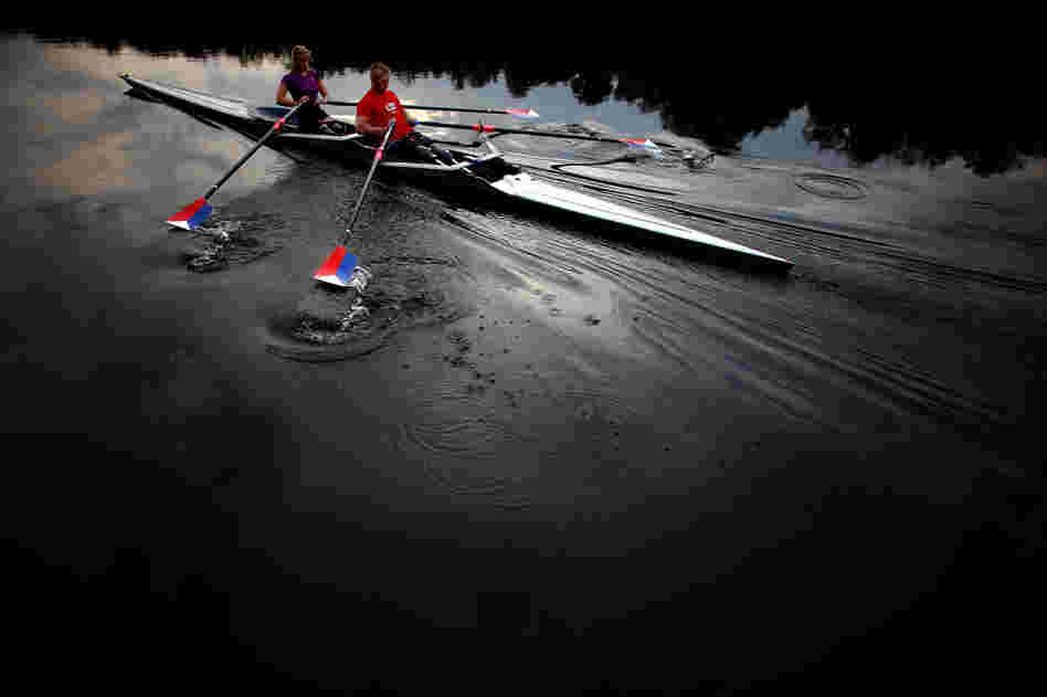 The teammates use a specially adapted rowing shell that is rigged with attachments so they can row comfortably, and slip in and out of the boat on their own.
