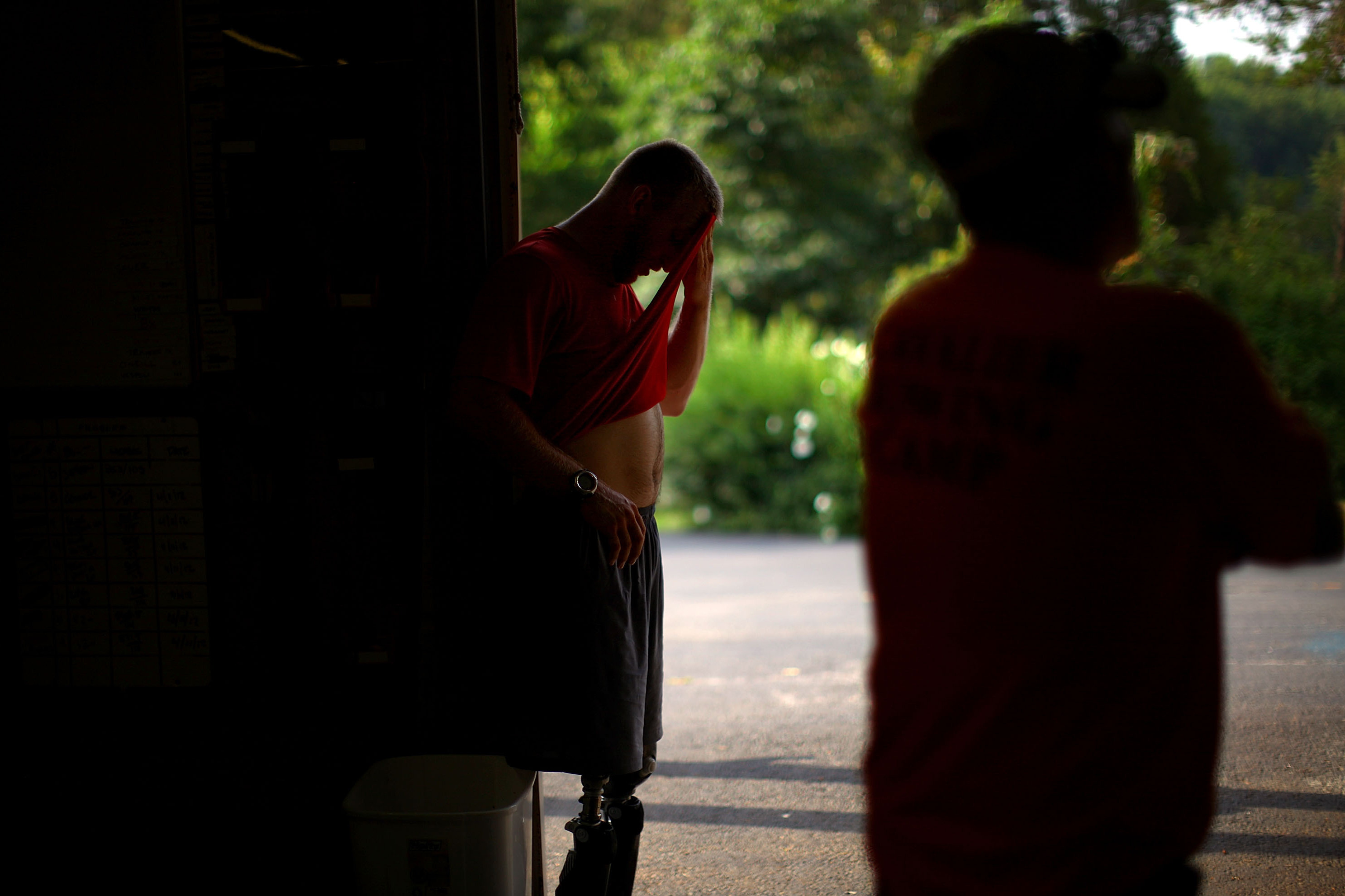 Jones wipes sweat from his head after a morning workout with Masters. Organizers of the games say the new vets raise the caliber of the competition; veterans say Paralympic sports provide inspiration and therapy for young, catastrophically injured soldiers.