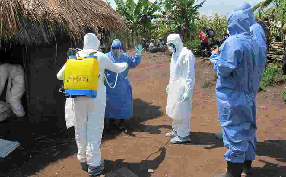 Disease detective Dr. Barbara Knust suits up to investigate an Ebola outbreak in Uganda last month. Knust chatted on Twitter last Wednesday about her career tracking down outbreaks for the Centers of Disease and Prevention.