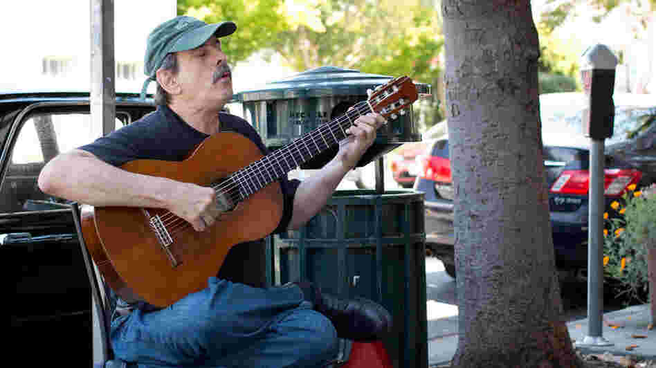 "My first memories are listening to music and feeling my body tingle," says Philip Rosheger, a classical guitarist who performs outdoors in Berkeley, Calif.