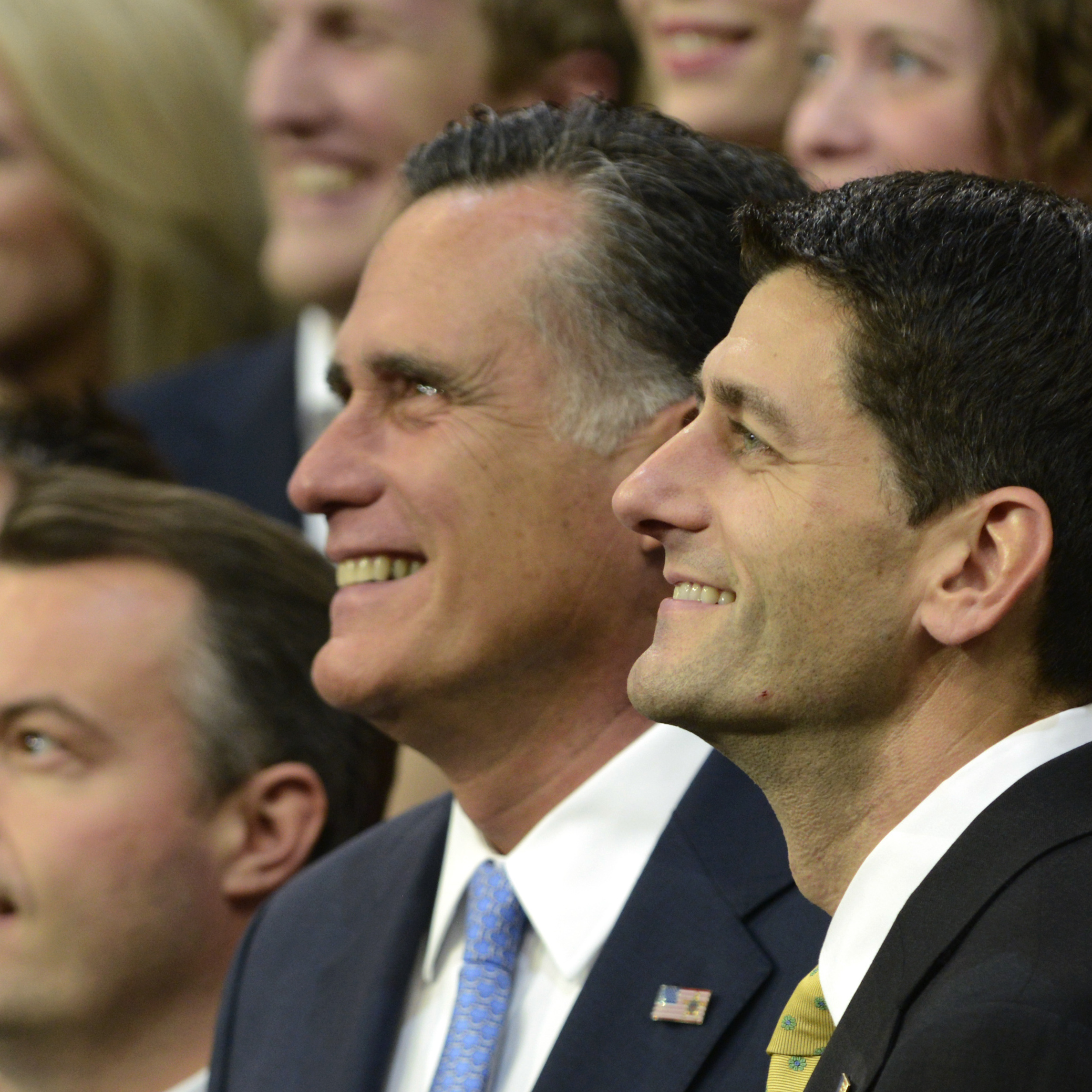 Republican presidential nominee Mitt Romney (center) and vice presidential nominee Paul Ryan came to the Tampa Bay Times Forum this afternoon to pose for a photo with campaign staffers. Tonight, Romney accepts his party's nomination.