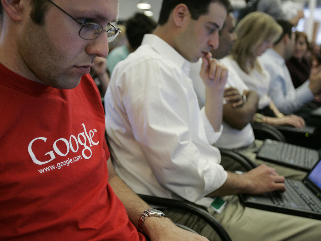 Group Genius: Rubbing shoulders with other smart people, like these employees at Google, fuels innovation.