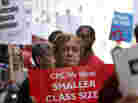 Chicago Teachers Union members picket on Aug. 22 in Chicago.