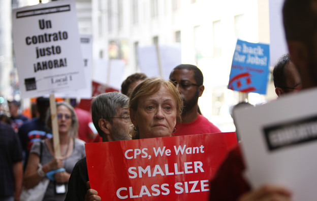 Chicago Teachers Union members picket on Aug. 22 in Chicago.