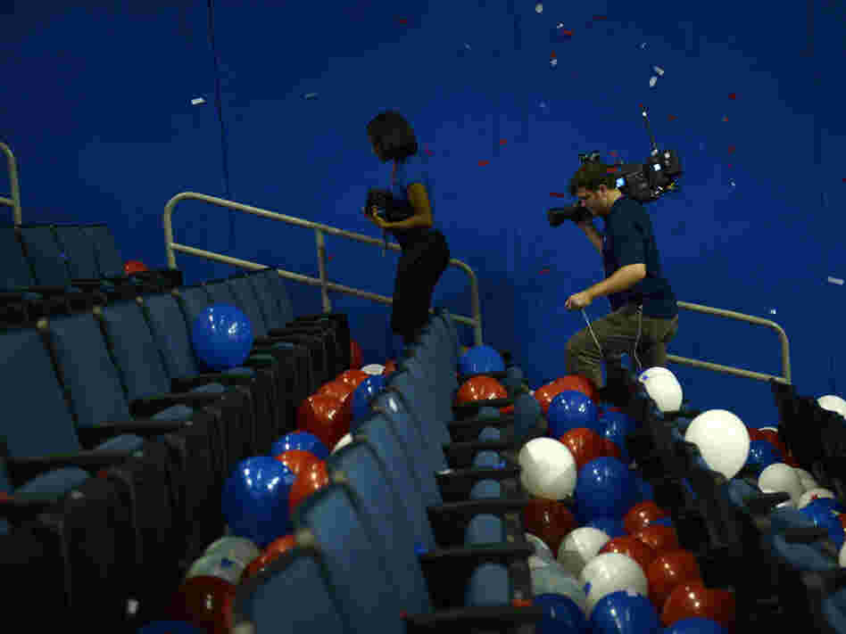 A camera crew leaves after the final day of the 2012 Republican national Convention at the Tampa Bay Times Forum August 29, 2012 in Tampa, Florida. Mitt Romney accepted the Republican nomination to run as the party's 2012 U.S. Presidential candidate against U.S. President Barack Obama.