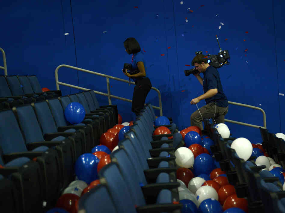 A camera crew leaves after the final day of the 2012 Republican national Convention at the Tampa Bay Times Forum August 29, 2012 in Tampa, Florida. Mitt Romney accepted the Republican nomination to run as the party's 2012 U.S. Presidential candidate against U.S. President Barack Obama.