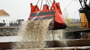 Over the next three years, a clamshell will scrape the bottom of Buffalo's waterfront harbor, scooping out contaminants from the city's industrial days.