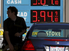 A man fills his gas tank Wednesday in Lyndhurst, Ohio. Gas prices surged as Isaac approached, but are expected to ease after Labor Day. A man fills his gas tank Wednesday in Lyndhurst, Ohio. Gas prices surged as Isaac approached, but are expected to ease after Labor Day.