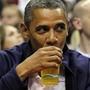 President Obama drinks a beer — that's presumably not from the White House — as he watches the U.S. men's basketball team play Brazil in an Olympic exhibition game in July. President Obama drinks a beer — that's presumably not from the White House — as he watches the U.S. men's basketball team play Brazil in an Olympic exhibition game in July.