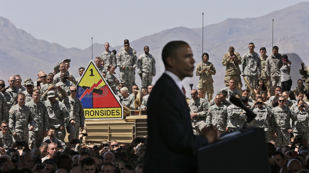 Members of the military listen to President Obama during his visit to Fort Bliss, Texas, on Friday.