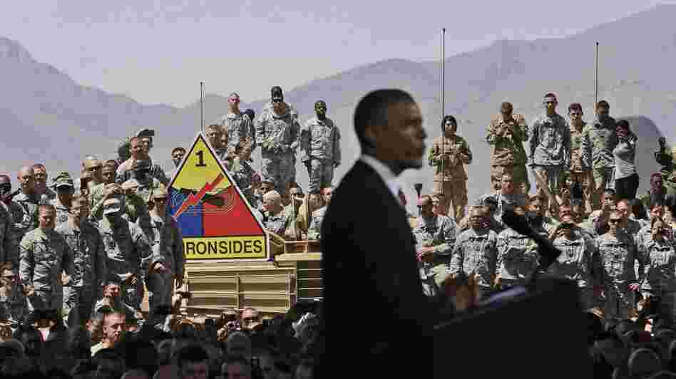 Members of the military listen to President Obama during his visit to Fort Bliss, Texas, on Friday.