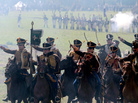 Members of historical clubs, dressed as Russian cavalry, advance during the 2010 re-enactment of the 1812 battle between Napoleon's army and Russian troops in Borodino. Members of historical clubs, dressed as Russian cavalry, advance during the 2010 re-enactment of the 1812 battle between Napoleon's army and Russian troops in Borodino.
