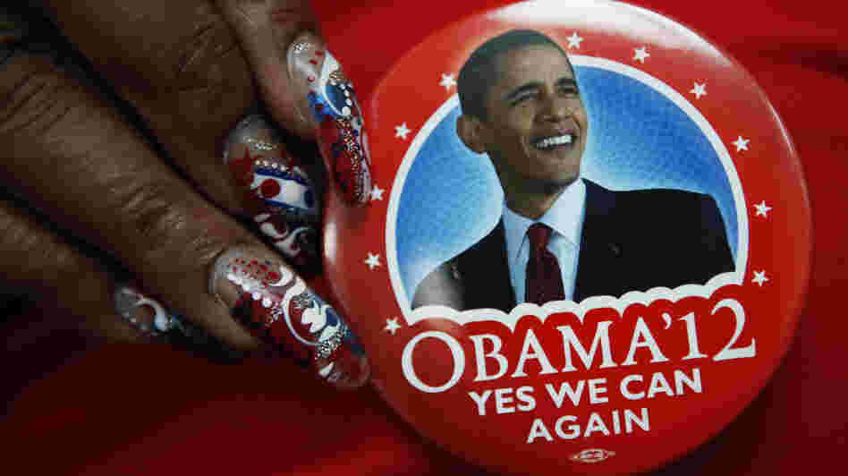 A delegate shows off her button on the eve of the Democratic National Convention in Charlotte, N.C.