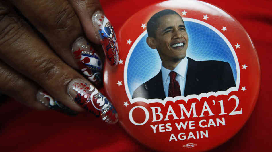 A delegate shows off her button on the eve of the Democratic National Convention in Charlotte, N.C.