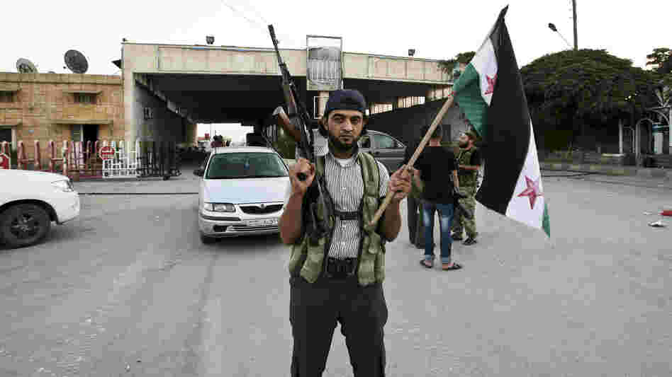 Syrian rebels captured the Bab al-Salam crossing on the border with Turkey in July. Large numbers of refugees fleeing northern Syria for Turkey come to the crossing, which is orderly and well-run, at least for now.