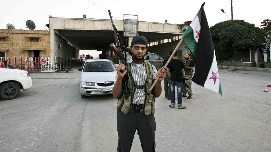 Syrian rebels captured the Bab al-Salam crossing on the border with Turkey in July. Large numbers of refugees fleeing northern Syria for Turkey come to the crossing, which is orderly and well-run, at least for now.