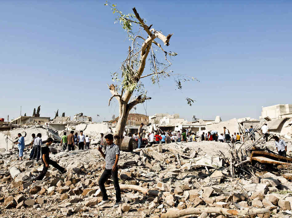 The Syrian army has been driven out of some towns in the country's northwest. But the Syrian Air Force has struck back in rebel-held places like Azaz, where at least 20 people were killed in this bombing raid on Aug. 15, according to residents.
