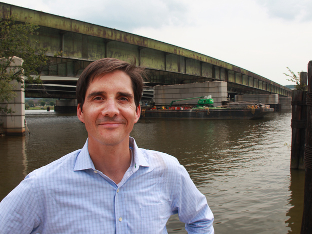 Scott Kratz, a volunteer adviser for the park proposal, stands in front of the old 11th Street Bridge. He's optimistic that advocates can raise the funds needed to complete the project.