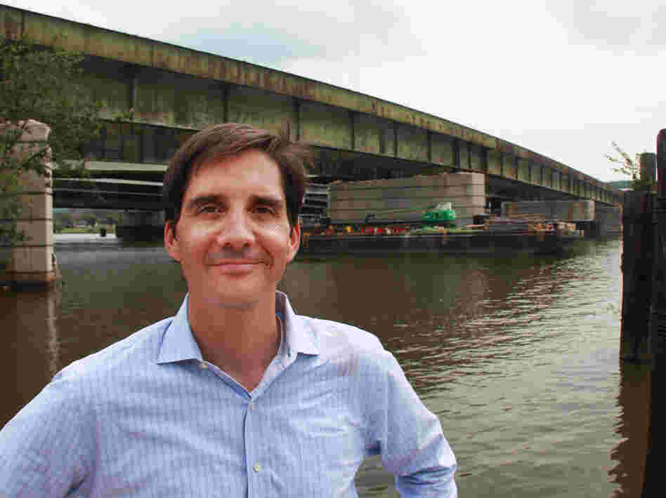 Scott Kratz, a volunteer adviser for the park proposal, stands in front of the old 11th Street Bridge. He's optimistic that advocates can raise the funds needed to complete the project.